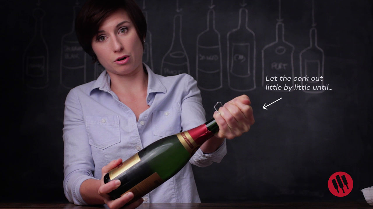 how to release a cork from champagne safely